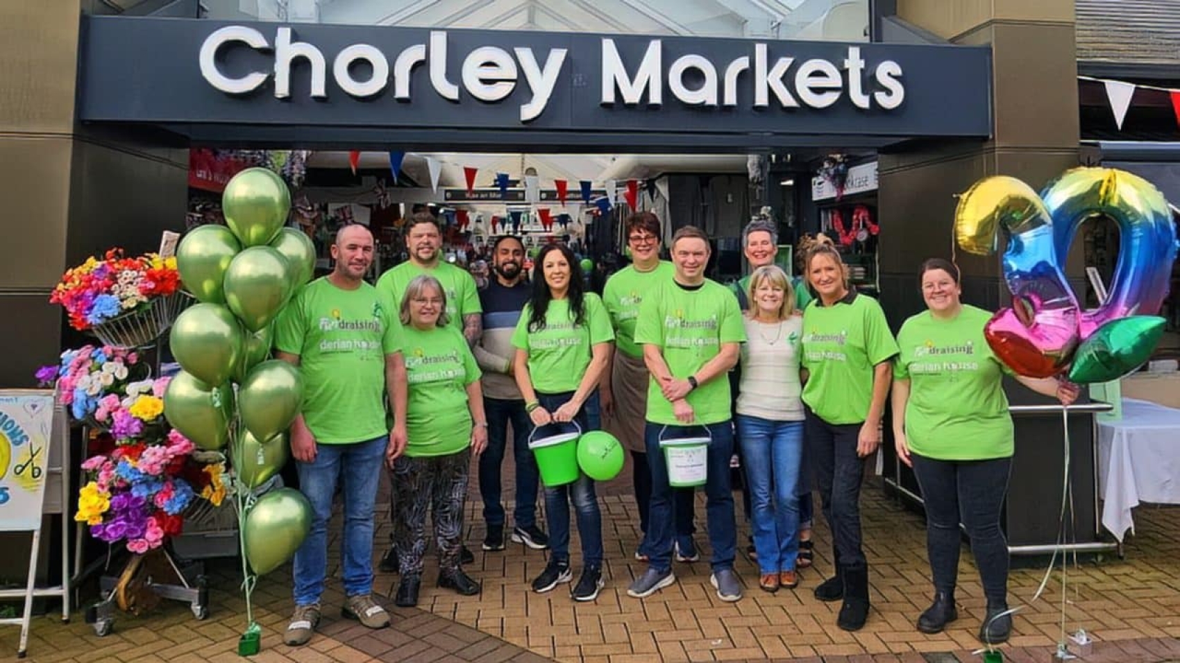 Chorley Market traders go green for 30 years of Derian House1@2x