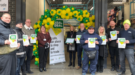 Cllr Donna Eley (centre left) and Pauline Rider (centre right) joined with other members of the markets team, City Council staff and Chelmsford Market traders for a colourful celebration of the market’s Real Deal accreditation in February this year