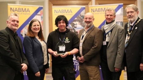 Britain's Favourite Market: South Molton Pannier Market.

From left to right: Market Place Europe Operations Manager Andy Pidgen, MP Julia Buckley, NABMA President Councillor Chris Poulter